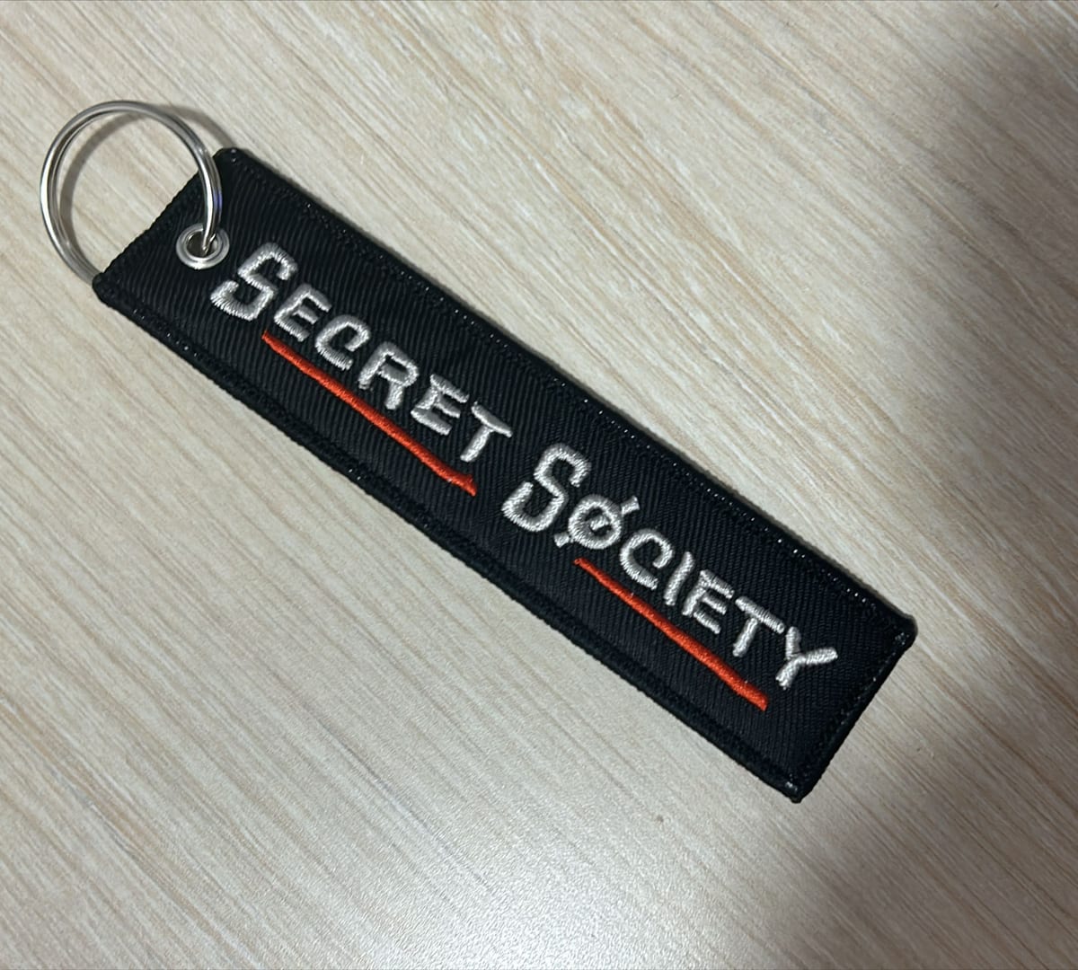 Personalización para Secret Society — Llaveros bordados